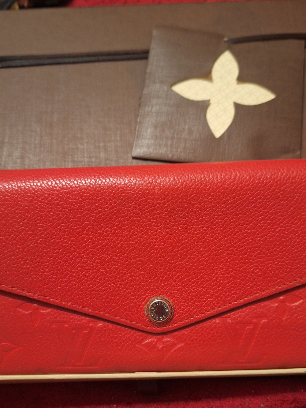 Preloved Aunthentic. Louis Vuitton Red Envelope Wallet with Monogram Embossing
